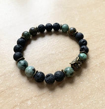 Load image into Gallery viewer, 6.9” bronze owl charm Stretchy Bracelet- lava beads and 8mm African jasper beads Aromatherapy bracelet