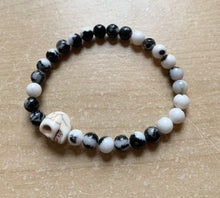 Load image into Gallery viewer, 6.9” Howlite Skull Bracelet- 6mm zebra jasper beads with hematite bead and howlite skull