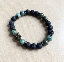 Load image into Gallery viewer, 6.9” bronze owl charm Stretchy Bracelet- lava beads and 8mm African jasper beads Aromatherapy bracelet