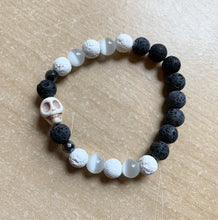 Load image into Gallery viewer, Skull’s Nature Bracelet - aromatherapy lava beads with howlite skull