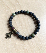 Load image into Gallery viewer, 6.9" Clubs Stretchy Bracelet bronze charm - 8mm dragons blood crystal beads and 8mm lava beads aromatherapy