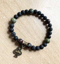 Load image into Gallery viewer, 6.9" Clubs Stretchy Bracelet bronze charm - 8mm dragons blood crystal beads and 8mm lava beads aromatherapy