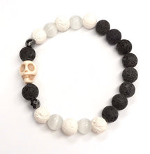 Load image into Gallery viewer, Skull’s Nature Bracelet - aromatherapy lava beads with howlite skull