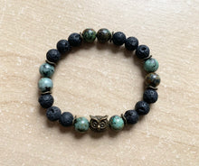 Load image into Gallery viewer, 6.9” bronze owl charm Stretchy Bracelet- lava beads and 8mm African jasper beads Aromatherapy bracelet