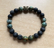 Load image into Gallery viewer, 6.9” bronze owl charm Stretchy Bracelet- lava beads and 8mm African jasper beads Aromatherapy bracelet