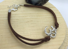 Load image into Gallery viewer, 8.25” Ohm charm Leather Bracelet

