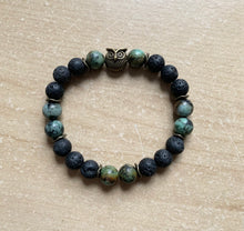 Load image into Gallery viewer, 6.9” bronze owl Bracelet- lava beads and 8mm African jasper beads
