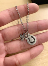 Load image into Gallery viewer, Luck with Luck Necklace- Stainless steel necklace with 4 leaf clover charm and circle horseshoe charm
