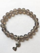Load image into Gallery viewer, 7.1” Superstitious Bracelet - gray Quartz with silver cat charm
