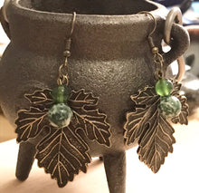 Load image into Gallery viewer, Large Leafy Earrings- bronze toned with green crystals
